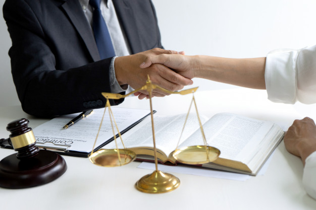 Lawyer-judge-with-gavel-balance-handshake 93025-219.jpg