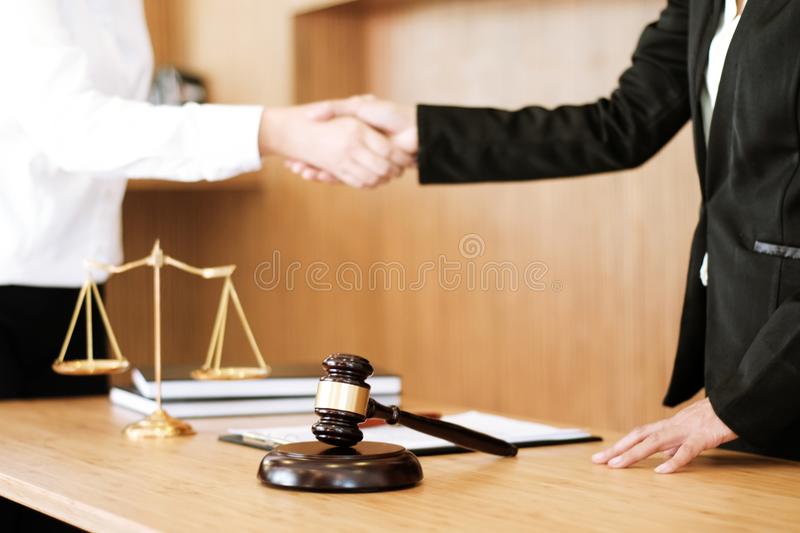 Female-lawyer-handshake-client-business-partnership-meeting-successful-concept-female-lawyer-handshake-client-business-123511778.jpg