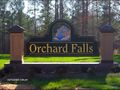 750px-Orchard falls front sub division sandblasted community sign with gold leaf classic signs nc800x600.jpg